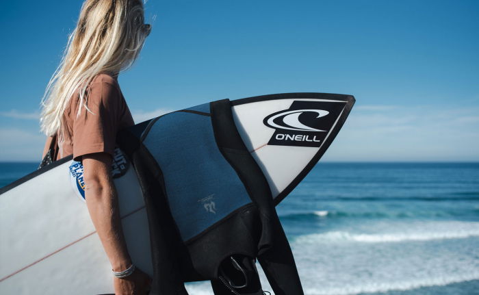 Surfer wearing an O'Neill Ninja wetsuit